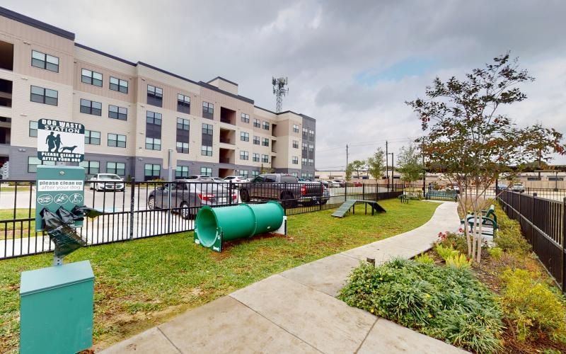a dog park in front of a building