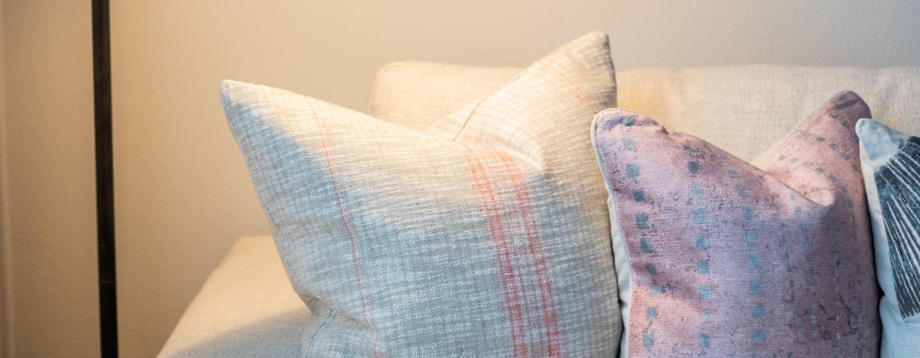 a lamp next to a couch